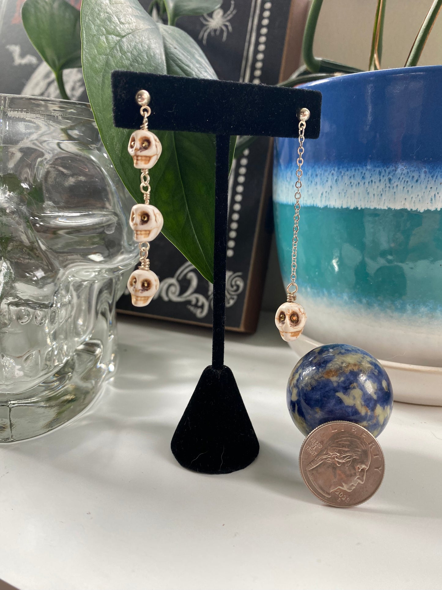 Lopsided earrings: 3 and 1 White Skulls HA23-EC0034