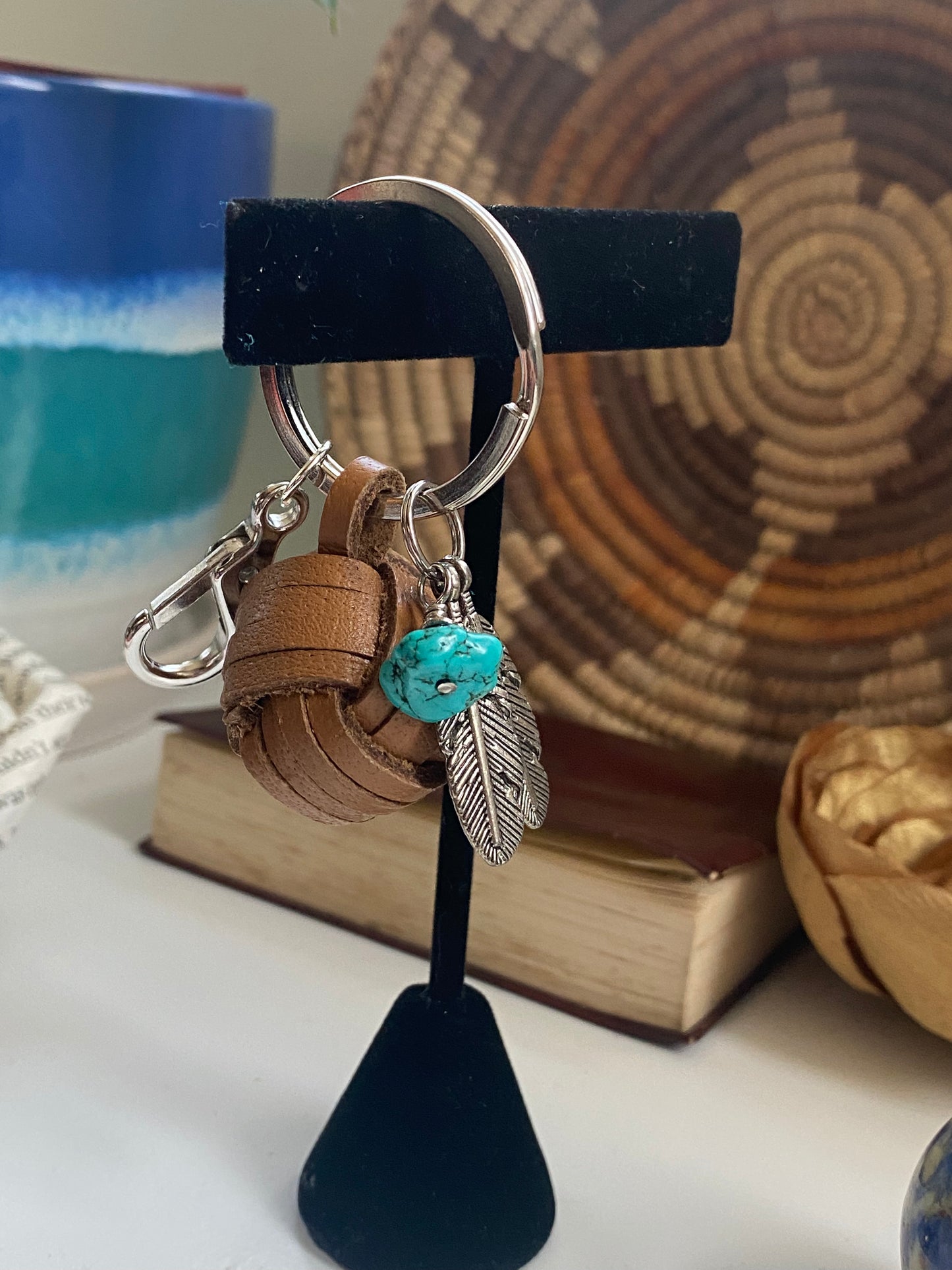 Leather ball with feather charms and turquoise bead keychain with a lobster claw clasp KC23-KC0013