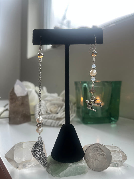 Lopsided earrings: Bird and wing with freshwater pearls